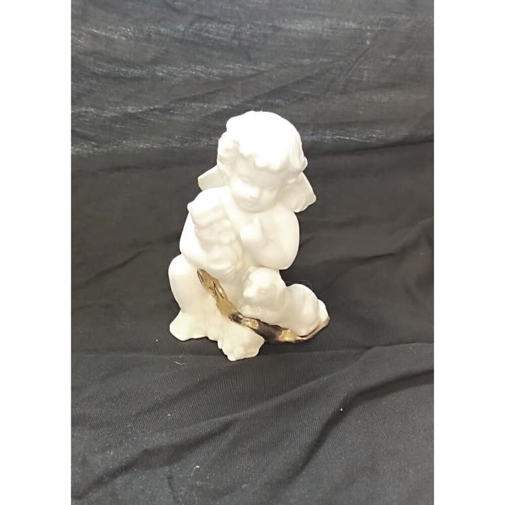 White Ceramic Cherub with Gold Sash Holding Cat and Dog